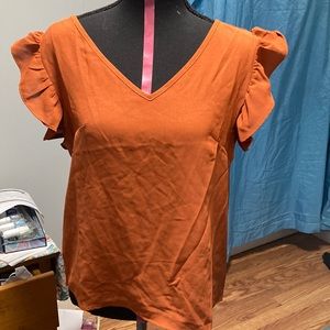 Orange brown top